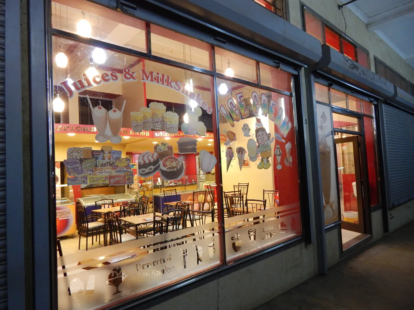 The glass-fronted House of Ice Cream parlour seen from the Clocktower Roundabout.